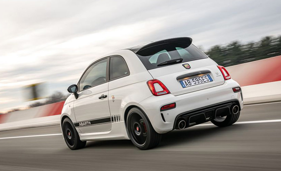 Abarth hatch driving on a track